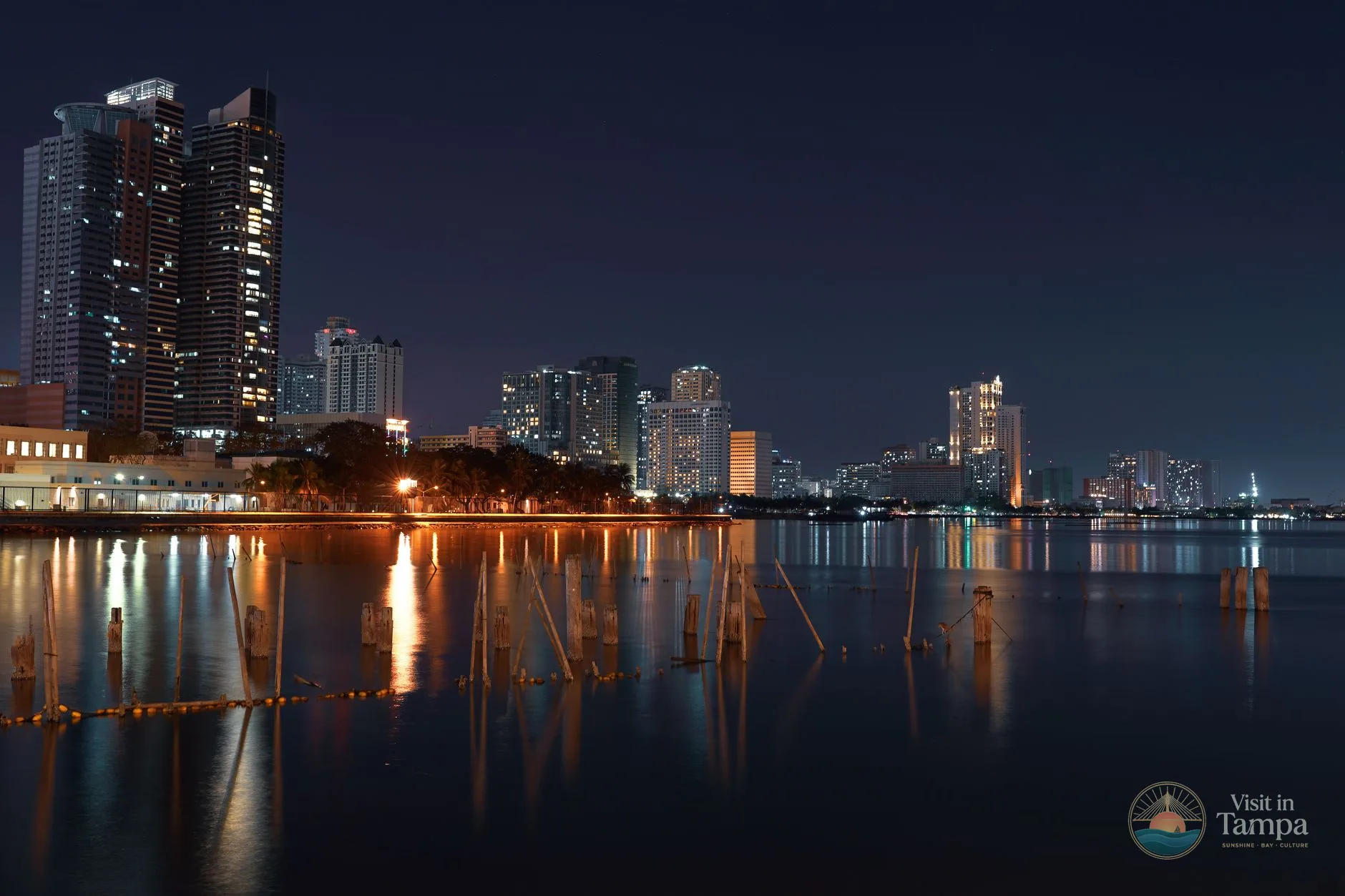 Downtown Tampa skyline across Hillsborough Bay at dusk