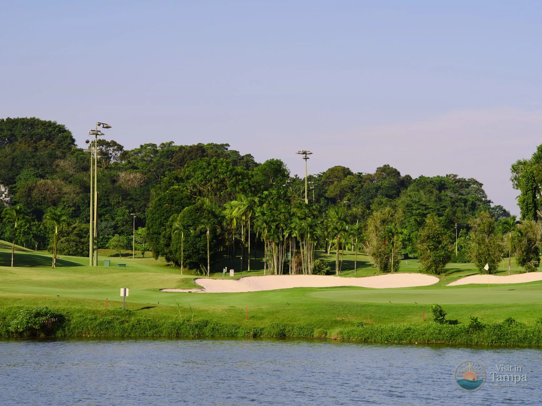 Water hazard and cypress trees along a fairway at TPC Tampa Bay in Lutz