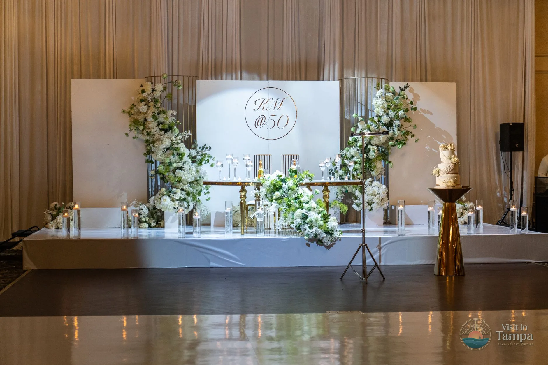 Ballroom at The Tampa EDITION set up for an event with white oak floors and high ceilings