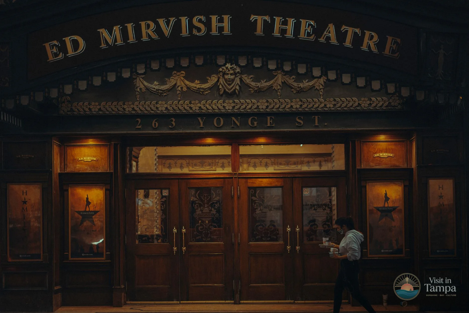 Tampa Theatre box office window on North Franklin Street, with the marquee overhead